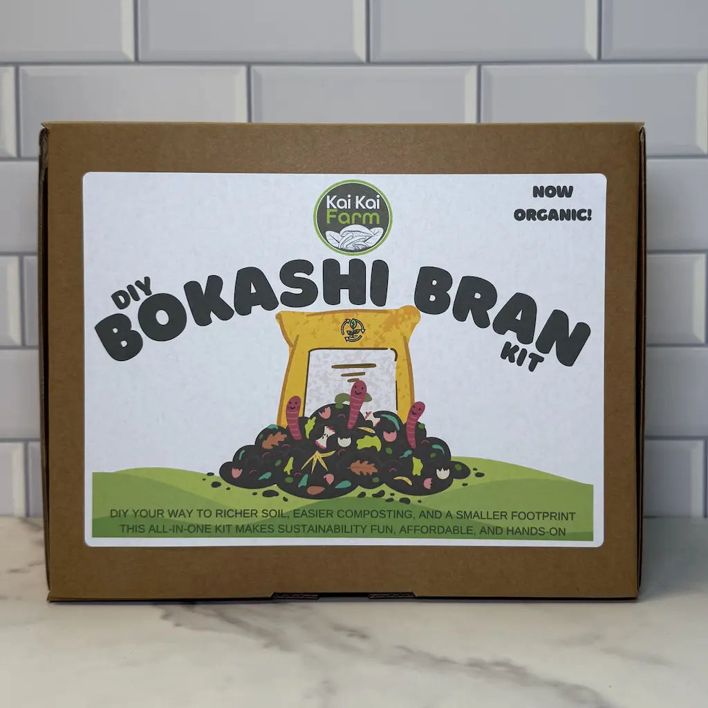 Kai Kai Farm DIY Organic Bokashi Bran Kit packaging on a marble surface with tiled wall background