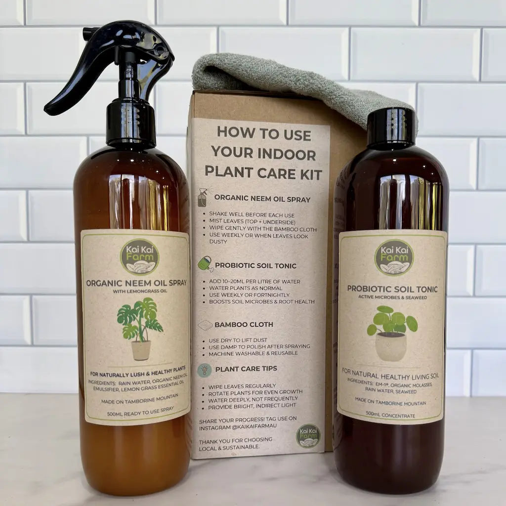 Indoor Plant Care Kit including organic neem oil spray and probiotic soil tonic for healthy indoor plants.