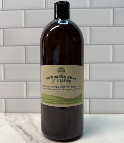 Bottle of Activated EM-1 on a tiled wall background