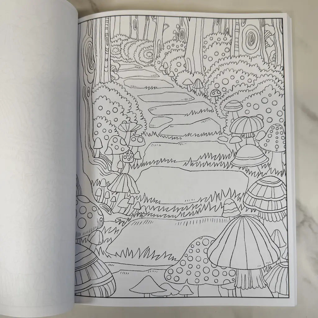Coloring book page with a black and white illustration of a forest scene with mushrooms and a path.