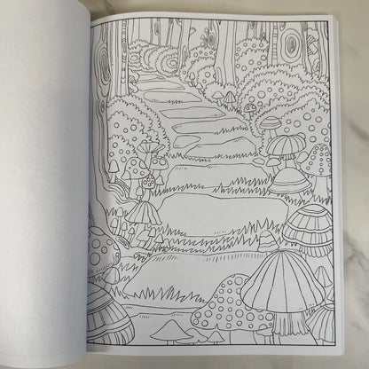 Coloring book page with a black and white illustration of a forest scene with mushrooms and a path.