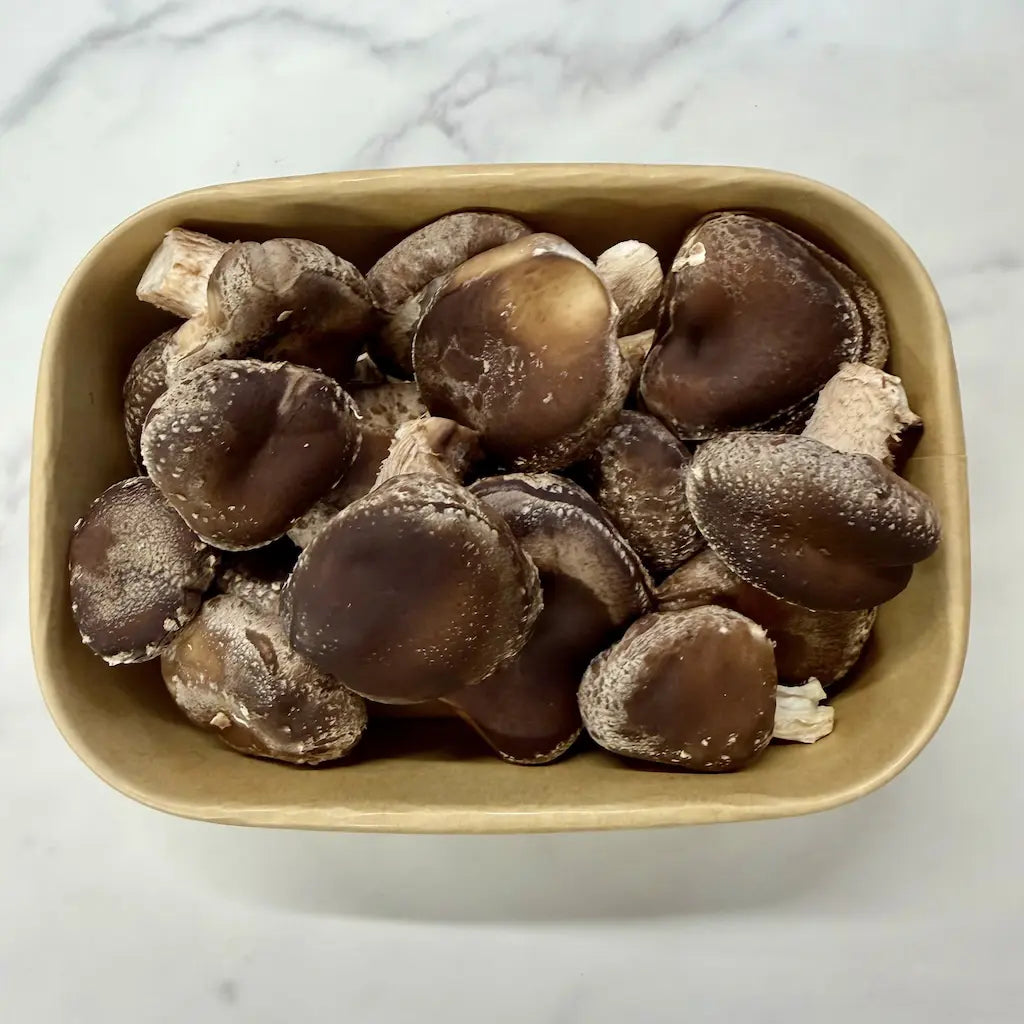 Small box of fresh organic no spray Shiitake mushrooms