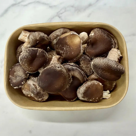 Small box of fresh organic no spray Shiitake mushrooms