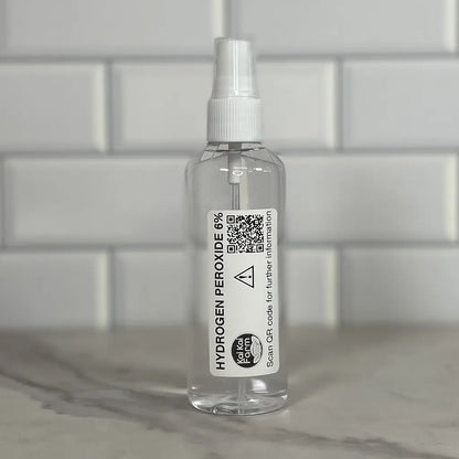 A 100mL spray bottle of 6% hydrogen peroxide