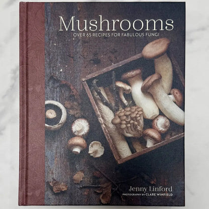 Cookbook titled 'Mushrooms' by Jenny Linford with images of mushrooms on the cover